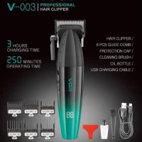 Машинка для стрижки волосся акумуляторна Professional Turbo з різними насадками VGR V-003. Колір: зелений