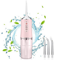 Ирригатор для чистки зубов и полости рта Oral Irrigator с аккумулятором и сменными насадками Pink